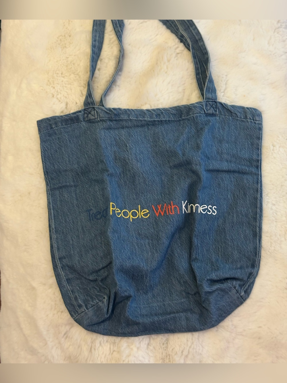 Harry Styles’ Treat People With Kindness denim tote